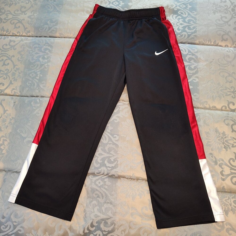 Nike boy's black/red/white track pants, VG to Excellent used cond., size M